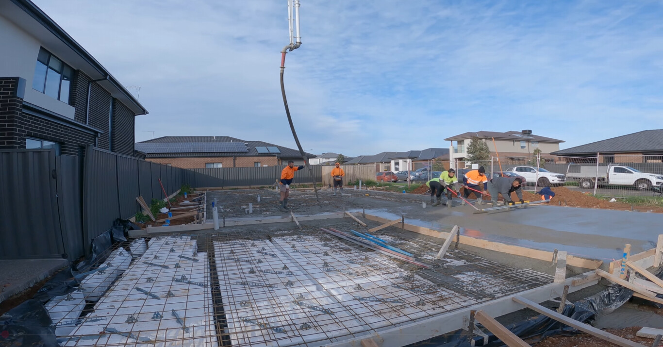 Concrete contractor pouring foundation slab in Redwood City